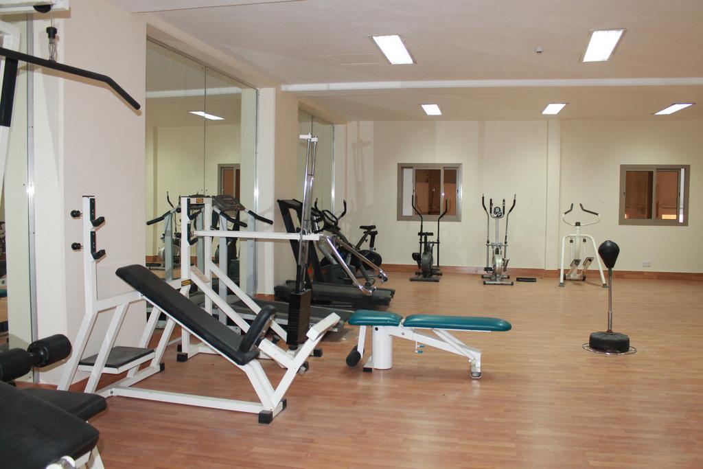 Al Hamra Plaza Apartman Manáma Szoba fotó