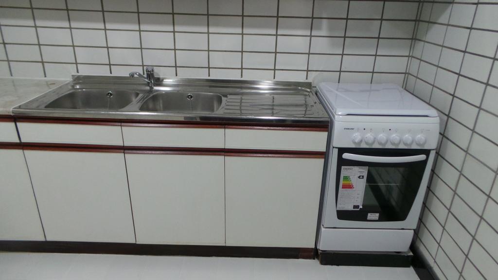Al Hamra Plaza Apartman Manáma Szoba fotó