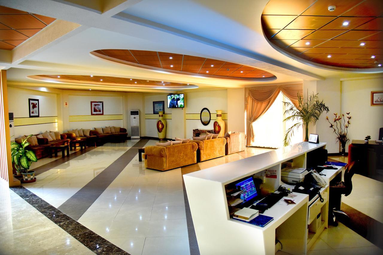 Al Hamra Plaza Apartman Manáma Szoba fotó