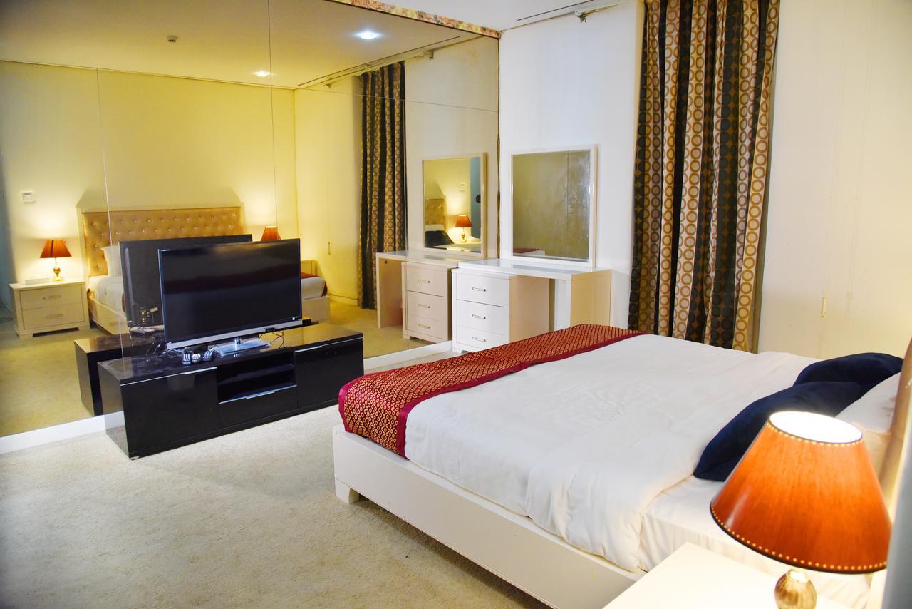 Al Hamra Plaza Apartman Manáma Szoba fotó