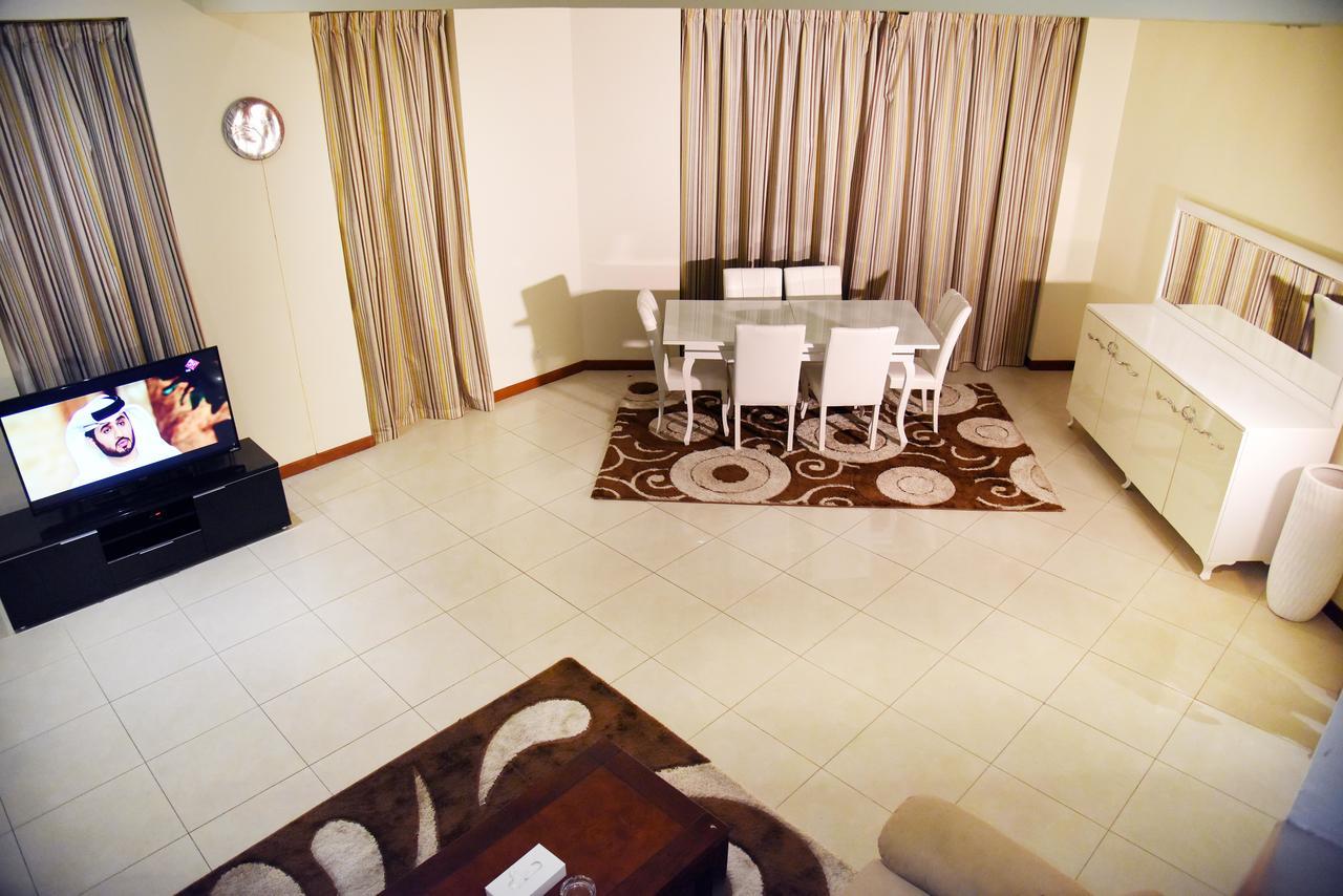 Al Hamra Plaza Apartman Manáma Szoba fotó