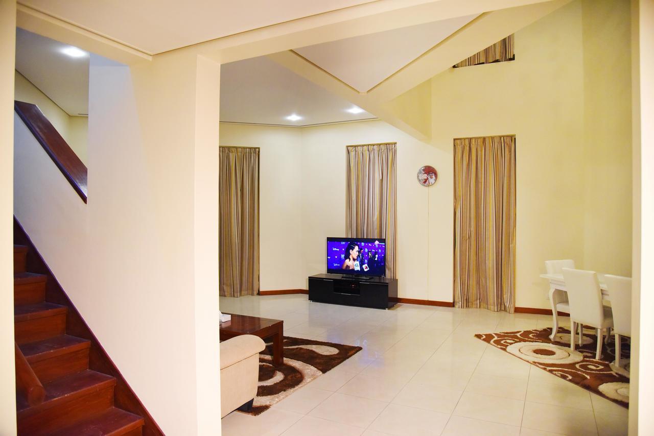 Al Hamra Plaza Apartman Manáma Szoba fotó